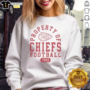 Alt Text: Premium Kansas City Chiefs Football Property 1960 sweatshirt featuring classic team colors and logo design.