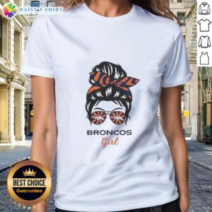 Top Denver Broncos girl in messy bun and glasses wearing a stylish ladies tee, showcasing team spirit and casual style.