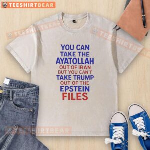 Premium washed t-shirt featuring 'You Can Take The Ayatollah Out Of Iran But You Can't Take Trump Out Of The Epstein Files' design.