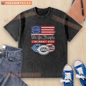 Top We The People Cincinnati Reds American Since 1776 washed t-shirt featuring vintage design and patriotic colors.
