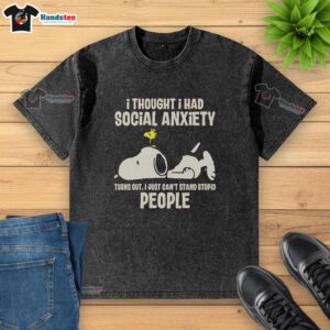 Alt Text: Snoopy graphic on a washed t-shirt with text about social anxiety and dislike for stupid people.