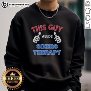 Alt Text: Official Philadelphia 76ers 'This Guy Needs Sixers Therapy' sweatshirt in navy blue, perfect for fans and cozy wear.