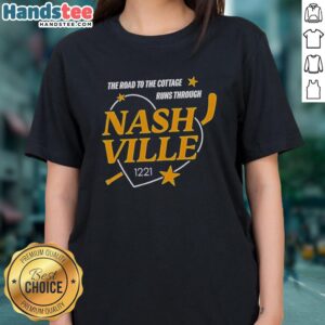Premium Nashville Predators Ladies Tee showcasing 'The Road To The Cottage' design in vibrant team colors.