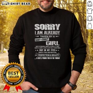 Funny sweatshirt with 'Sorry, I'm Already Taken by a Sexy and Crazy Girl' design, perfect for playful couples.