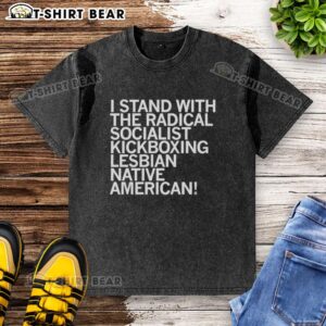Alt Text: Top Sharice I Stand With The Radical Kickboxing Lesbian Native American Washed T-Shirt displayed on a hanger.
