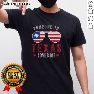 Top Someone In Texas Loves Me On Champion T-Shirt featuring bold text and vibrant colors, perfect for Texas pride.