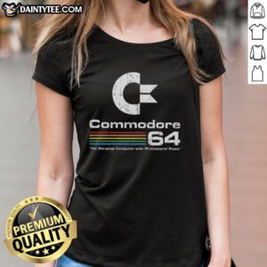 Awesome Commodore 64 personal computer with Professional Power Ladies tee displayed on a stylish desk setup.