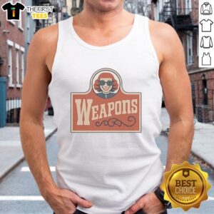 Alt Text: Aunt Gladys wearing a tank top in 'Pretty Weapons' by Zach Cregger, showcasing a unique style and vibrant colors.