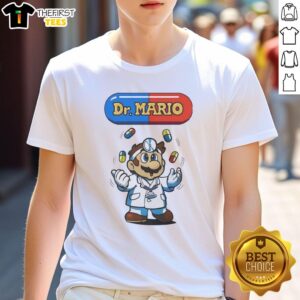 Alt Text: Pretty Dr. Mario juggling colorful pills on a stylish t-shirt, perfect for gaming fans and retro Nintendo lovers.