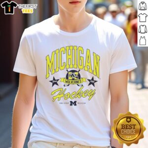 Alt Text: Nice University of Michigan Hockey Wolverines heritage t-shirt featuring team colors and logo, perfect for fans.