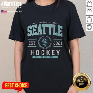 Alt Text: Nice Seattle Kraken Hockey Legacy Crest Ladies Tee featuring team colors and logo, perfect for fans and stylish wear.