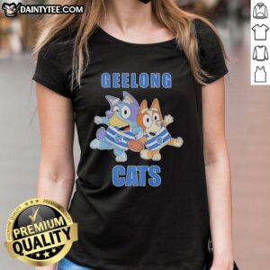 Women in Nice Bluey Bingo Geelong Cats rugby outfits cheer for their team at a football match, showcasing fan spirit.
