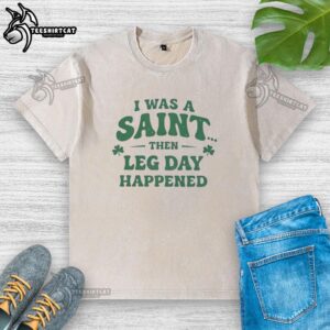 Premium 'I Was A Saint Then Leg Day Happened' St. Patrick's Day washed t-shirt for fitness enthusiasts.