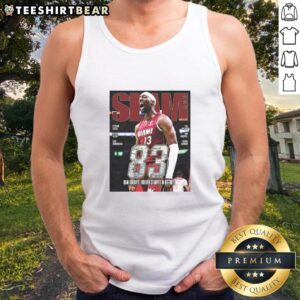 Alt Text: Hot Bam Adebayo of Miami Heat soaring for an 83-point slam, wearing a stylish 261 Magazine tank top.