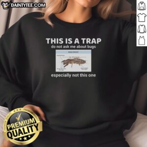 Funny sweatshirt with 'This Is A Trap' text, warning against bug questions, perfect for humor lovers.