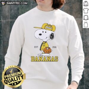 Nice Peanuts Snoopy X Savannah Bananas Est 2016 Sweatshirt featuring vibrant colors and playful design with Snoopy.