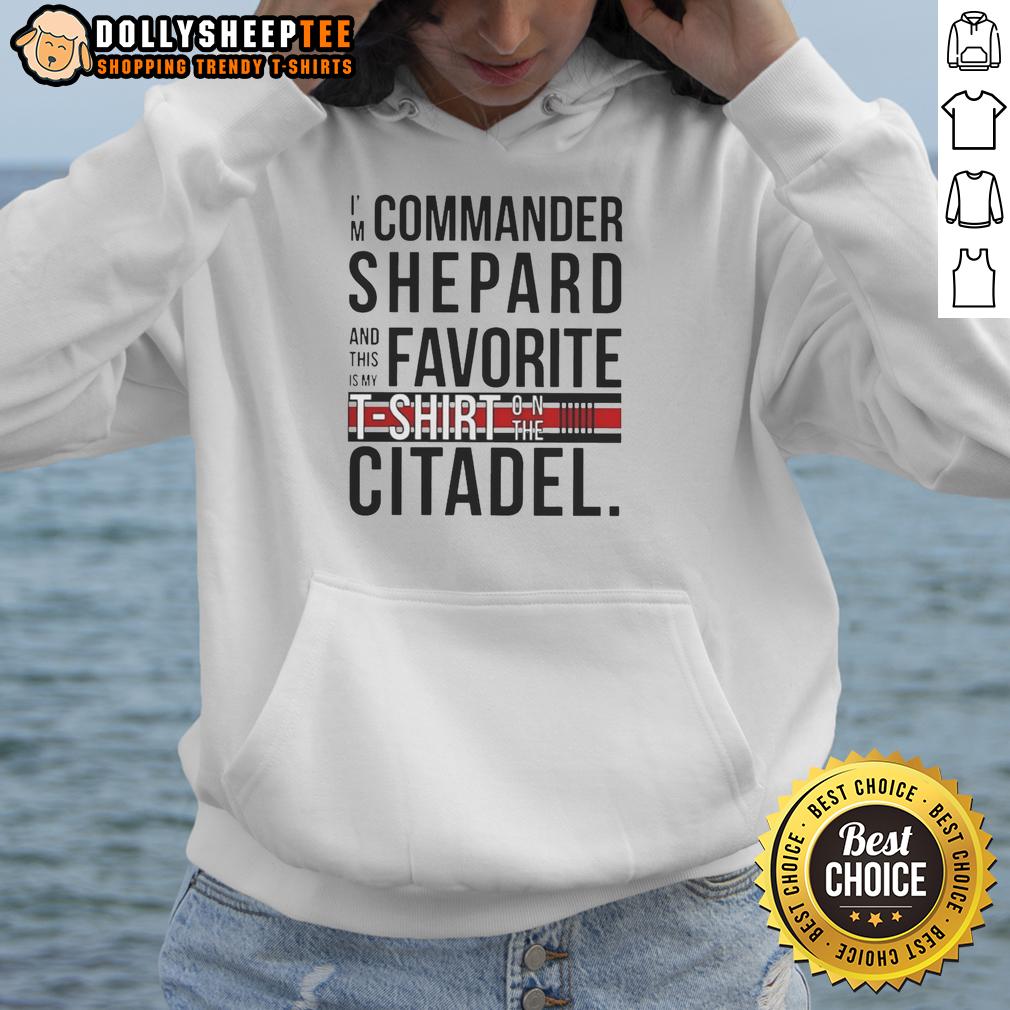 Official I'm Commander Shepard And This Is My Favorite Shirt On The Citadel Hoodie Alt Text: Commander Shepard wearing a This is my favorite shirt hoodie on the Citadel in Mass Effect.