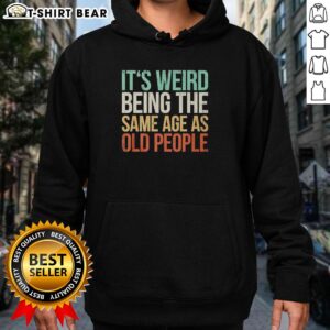 Vintage hoodie featuring 'It's weird being the same age as old people' design, perfect for unique fashion statements.