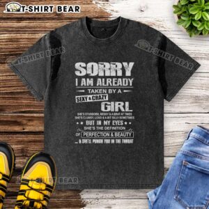 Funny washed T-shirt saying 'Sorry, Im already taken by a sexy and crazy girl' with a playful design.