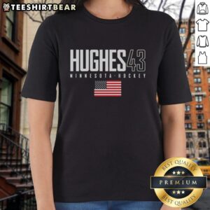 Top Quinn Hughes 43 Minnesota Wild USA Flag Elite Ladies Tee showcasing vibrant team colors and stylish design.