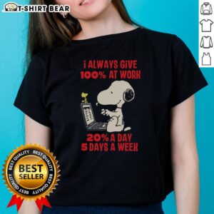 Alt Text: Cute Snoopy graphic on a ladies tee with 'I Always Give 100% at Work - 20 a Day, 5 Days a Week' slogan.