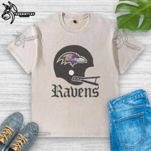Baltimore Ravens football logo on a big helmet design featured on a washed t-shirt, perfect for fans.