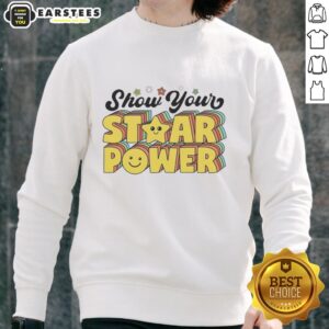 Alt Text: Teacher and student wearing 'Show Your STAAR Power' sweatshirt, showcasing motivation on testing day.