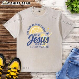Nice Life Gave Me Lemons But My Jesus Makes Lemonade washed t-shirt design featuring vibrant lemon graphics and uplifting text.
