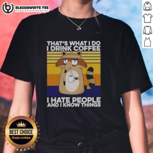 Official Grumpy Raccoon tee featuring the phrase 'That's What I Do I Drink Coffee' for ladies. Perfect for coffee lovers!