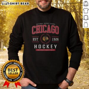 Alt Text: Awesome Chicago Blackhawks Hockey Legacy Crest Sweatshirt featuring team colors and iconic logo design.