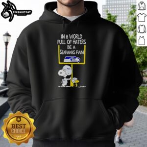 Alt Text: Premium Snoopy hoodie featuring Seahawks fan design, perfect for showing team spirit in a world of haters.