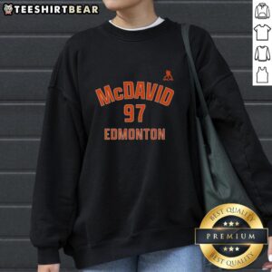Alt Text: Pretty Connor McDavid 97 Edmonton Oilers name and number sweatshirt showcasing team pride and style.