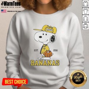 Cute Snoopy wearing Savannah Bananas outfit sweatshirt, established 2016, showcasing playful baseball spirit.
