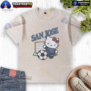 Alt Text: Original San Jose Earthquakes FC x Hello Kitty washed t-shirt featuring a colorful graphic design and soft fabric.