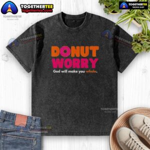 Good Donut Worry God Will Make You Whole washed t-shirt in a cozy setting, featuring a playful donut graphic.