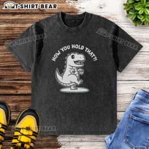 Alt Text: Top T-Rex dinosaur graphic on a washed t-shirt, showcasing a vibrant design perfect for dino lovers.