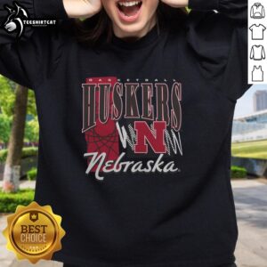 Premium Nebraska Huskers basketball graphic sweatshirt featuring bold team logo and vibrant colors for fans.