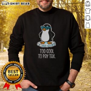 Stylish sweatshirt featuring cool penguins protesting against tariffs, perfect for tax season awareness and fashion.