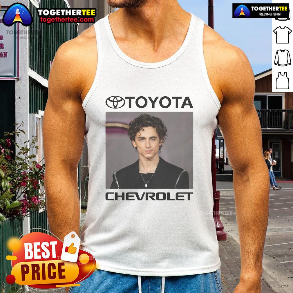 Awesome Car Brand Actor Tank Top Actor wearing an Awesome Car Brand tank top, showcasing style and brand loyalty at a summer event.