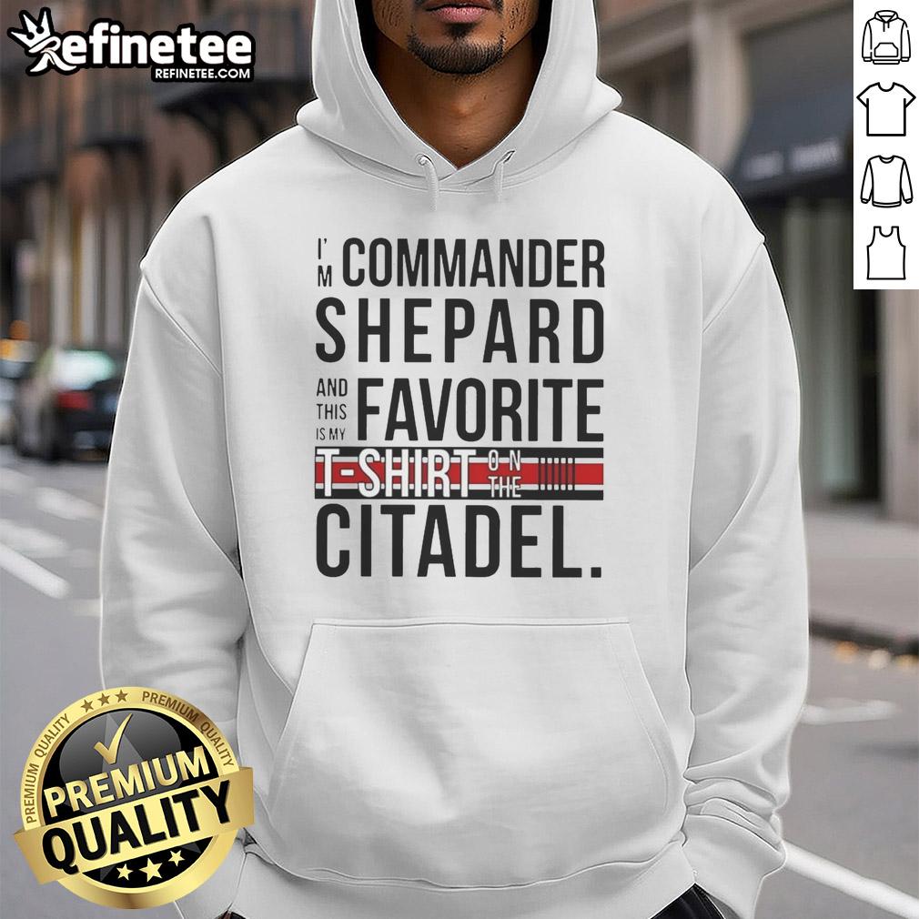 awesome-im-commander-shepard-and-this-is-my-favorite-shirt-on-the-citadel-hoodie Alt Text: Commander Shepard wearing an 'Awesome I'm Commander Shepard and This Is My Favorite Shirt' hoodie on the Citadel.