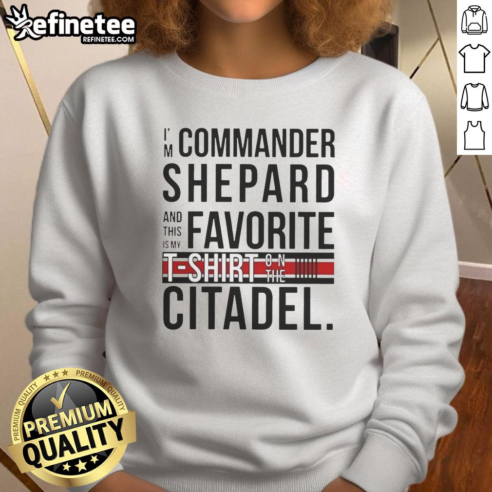 awesome-im-commander-shepard-and-this-is-my-favorite-shirt-on-the-citadel-sweatshirt Alt Text: Commander Shepard wearing 'Awesome I'm Commander Shepard' sweatshirt on the Citadel, showcasing iconic Mass Effect style.