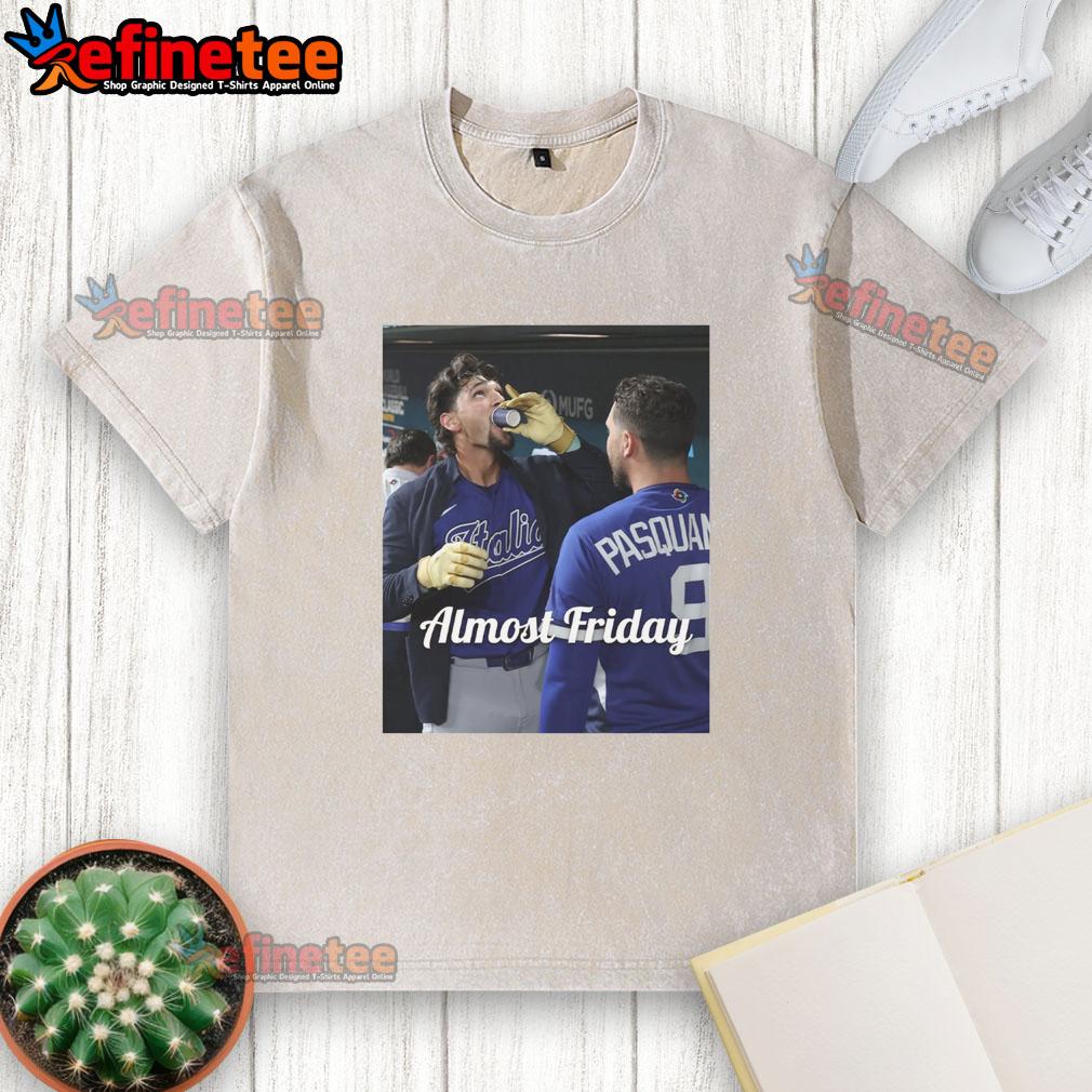 awesome-jac-caglianone-of-kansas-city-royalsdrinking-espresso-in-dugout-zone-almost-friday-washed-t-shirt Alt Text: Kansas City Royals' Jac Caglianone enjoying espresso in the dugout, wearing a stylish 'Almost Friday' washed t-shirt.