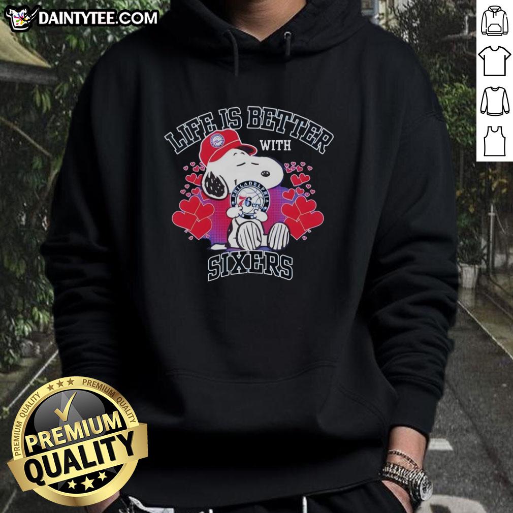 awesome-snoopy-holding-philadelphia-76ers-logo-life-is-better-with-sixers-hoodie Snoopy wearing a Philadelphia 76ers hoodie with 'Life Is Better With Sixers' slogan, showcasing team spirit.