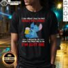 Awesome Stitch holding beer mug wearing 'I Am What I Am I'm Not What You Think I Should Be' T-shirt design.