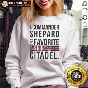 Commander Shepard wearing a favorite sweatshirt on the Citadel, showcasing iconic Mass Effect style and fandom.