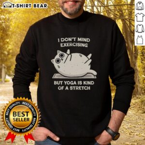 Original I Dont Mind Exercising But Yoga Is Kind Of A Stretch sweatshirt in a cozy setting, perfect for fitness enthusiasts.