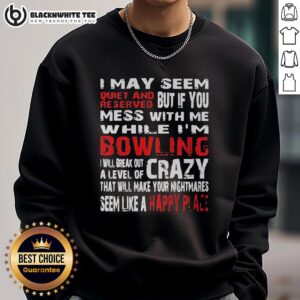 Hot sweatshirt with bold text: 'I May Seem Reserved But If You Mess With Me While I'm Bowling' showcasing a fun bowling vibe.