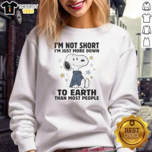 Pretty Snoopy sweatshirt with 'I'm not short, I'm just more down' text, showcasing a cute and playful design.