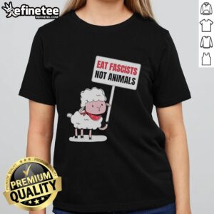 Alt Text: Original sheep holding a sign that says Eat Fascists, Not Animals on a funny ladies' tee shirt design.