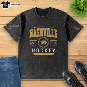 Alt Text: Official Nashville Predators Hockey Legacy Crest Washed T-Shirt featuring a vintage design and team logo.